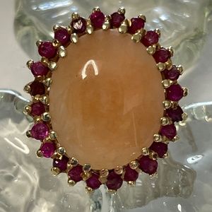 Giant Coral Jade Ring surrounded by Natural Rubies on a 14K Gold Band